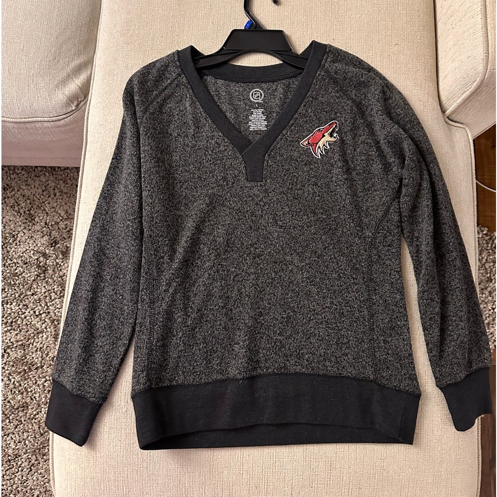 women’s light Arizona Coyotes sweater, an NHL official licensed product.